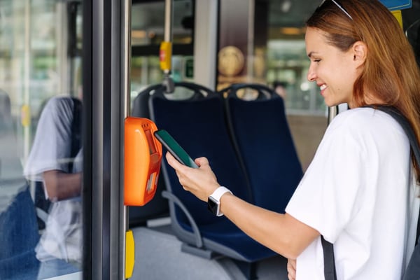 Woman_scanning_bus_ticket