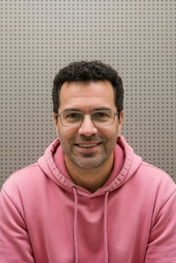 Deepfake example, a man in a pink hoodie