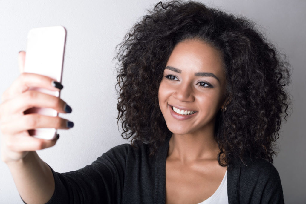A woman is taking selfie 
