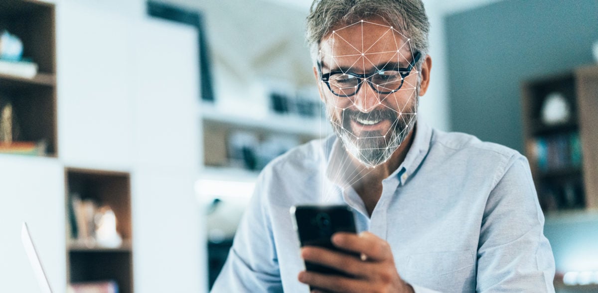 Customer-Onboarding_Man-Phone-Face-Scan
