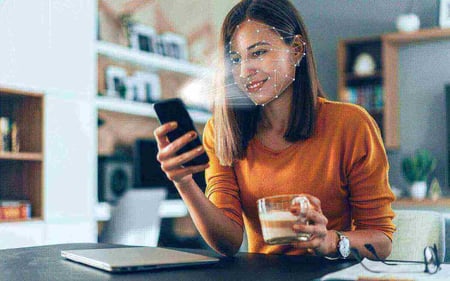 202206_LP_JPG_Customer-Onboarding_E-Health_Woman-Face-Scan-Coffee-Phone
