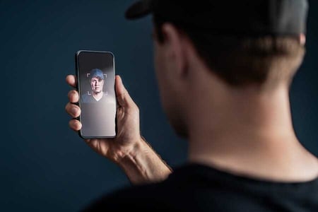 Man-verifying-ID