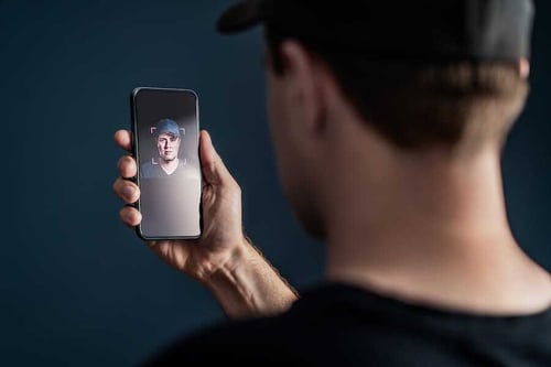 Man-verifying-ID