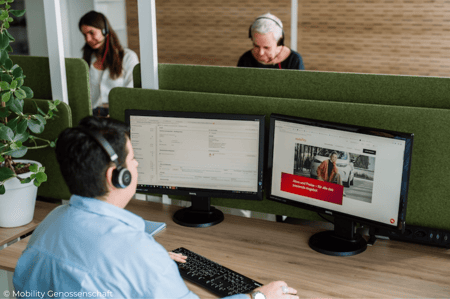 Man working on Computer Mobility