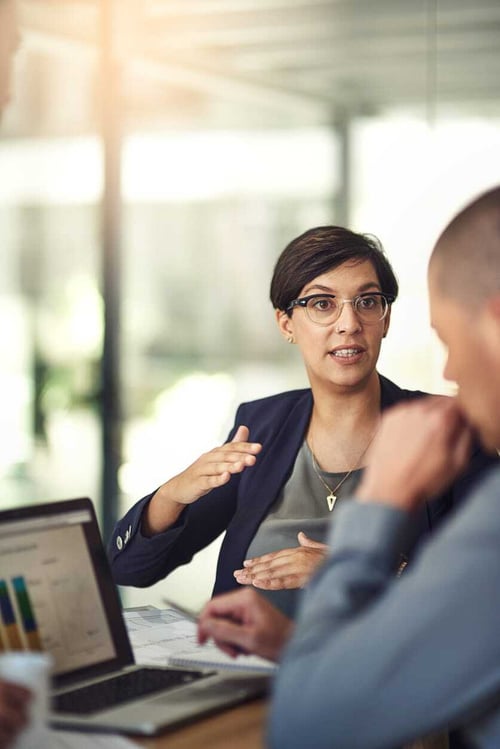 Two colleagues are discussing
