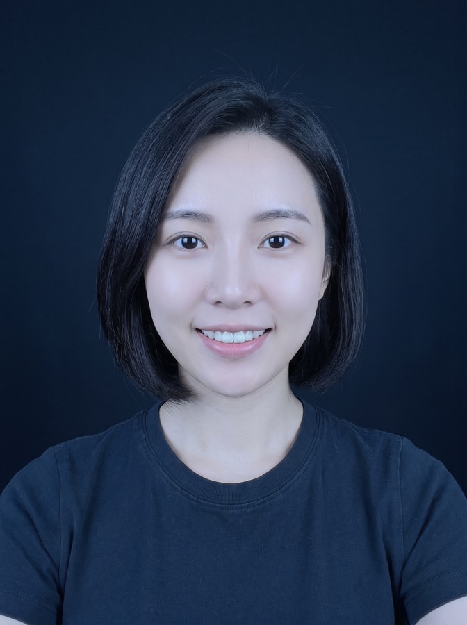 AI-generated fictional person: a young woman at a platform profile check, a face generated from nothing